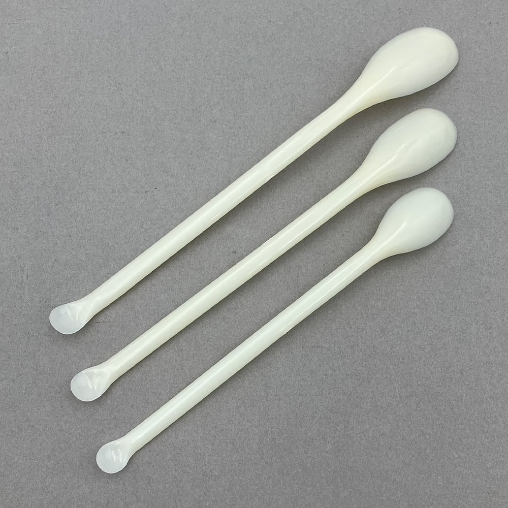 White plastic spoon made of ABS, set of 3, large, medium and small