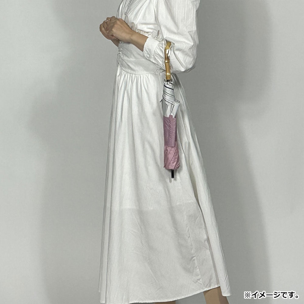 Short wide umbrella for both sunny and rainy days, black coated lining, dungaree style cut-and-sew print, coral pink x off, 1 pc