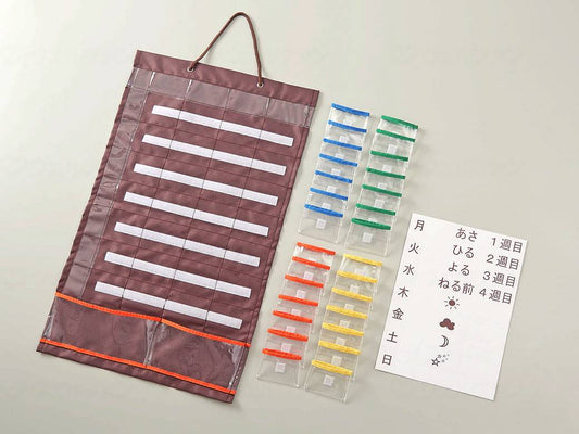 A medicine calendar that makes it easy to insert and dispense Cojit